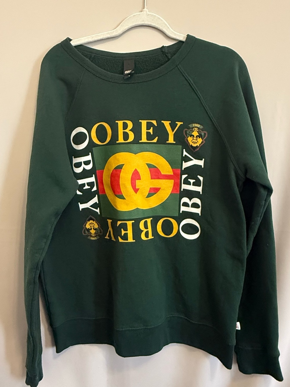 Obey Men's Forest Green Crewneck with Yellow & Red Graphic
